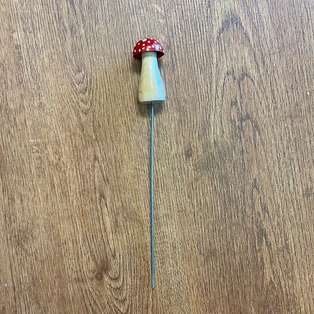 Red and white wooden mushroom