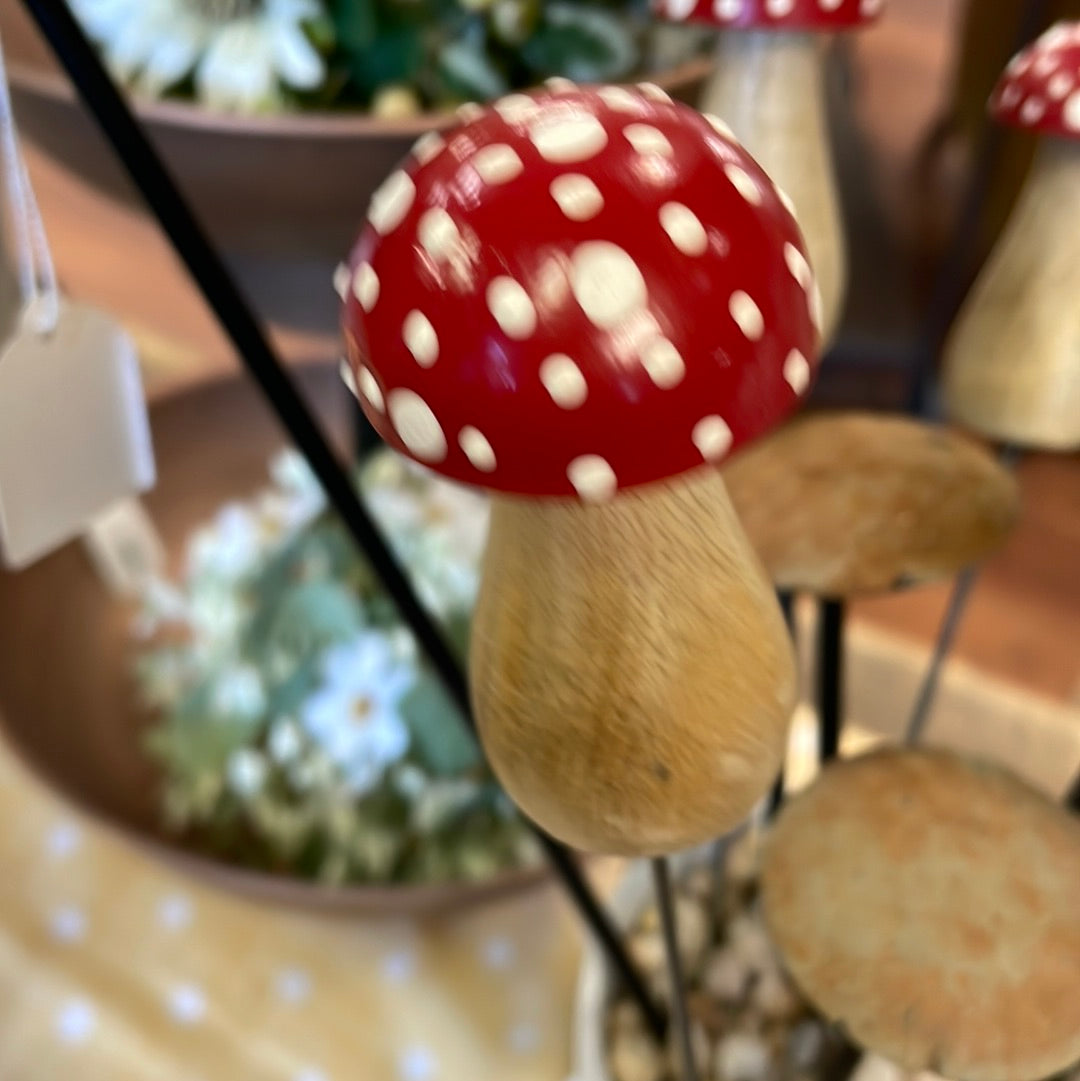 Red and white wooden mushroom