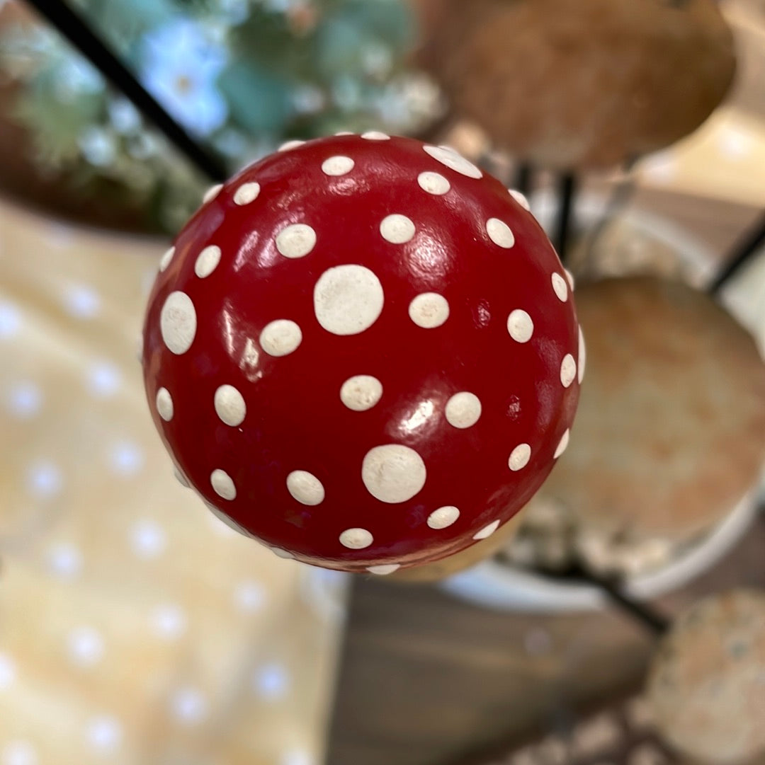 Red and white wooden mushroom